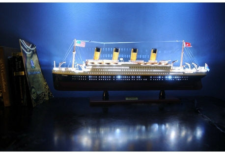 Master craftsmen handcraft Titanic Model Ship highly detailed wood ship from scratch using historical photographs, drawings and original plan.