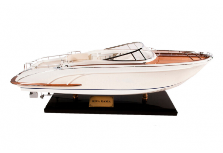 This Riva Rivarama powerboat has a hand painted gloss cream white hull and a mahogany & cedar strip deck varnished with many coats of clear varnish. 