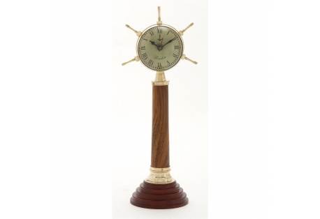 Decorative Brass clock on wooden post 
