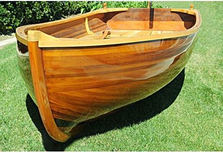 red cedar covered in a layer of fiberglass and epoxy resin dinghy 