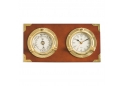 Two Porthole Quartz Clock and Barometer on Teak Finished Wood. Wall mounts horizontally.